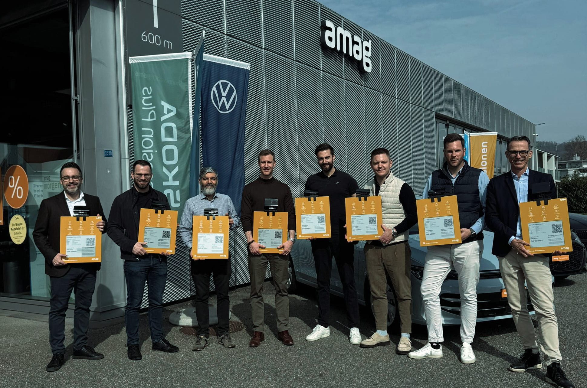 Project team from AMAG, and BOPP Solutions celebrating the successful rollout of next-generation digital price displays.