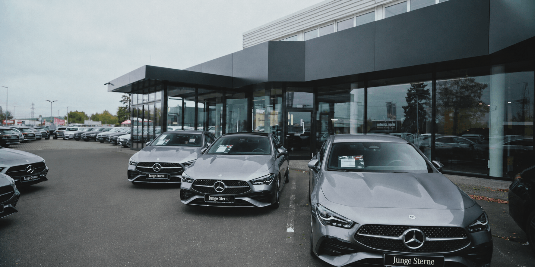 Exterior view of the Autohaus Schad Mercedes-Benz dealership in Bad Kreuznach, Germany.